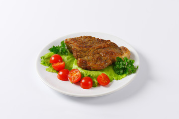 marinated pork steak with vegetebles