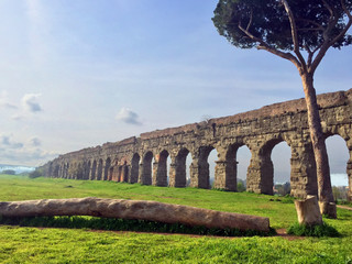 Roman aqueduct in Italy ancient stone structure - landscape color photo