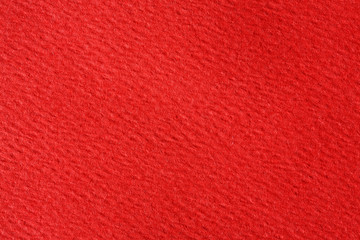 Blank textured red paper background.