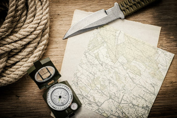 Map, compass, knife and rope