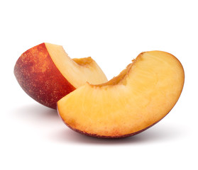 Nectarine fruit slice isolated on white background close up