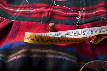 view of a tailored suit from a tailor in his studio