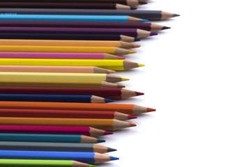 Fototapeta premium colored pencils on a blank sheet of paper