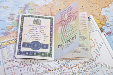 Fototapeta na wymiar British Passport on world map