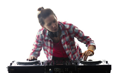 DJ playing music at mixer on light background