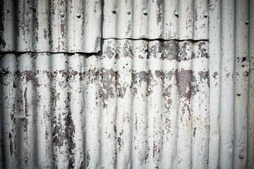 Corrugated iron rough and peeling paint