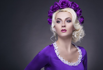 Beauty Concept and Ideas. Caucasian Female Posing in Purple Dress