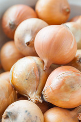 Close - up Pile of small gold onion
