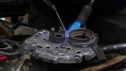 close-up of the welding blowtorch - Powered by Adobe