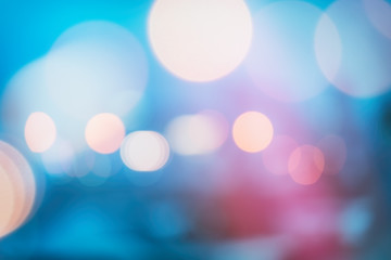 abstract background with bokeh defocused lights and shadow from christmas night party, vintage or retro color tone