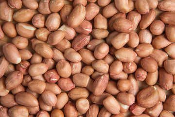 close up pile of peanut on the wooden background