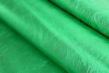 Green leather texture close up