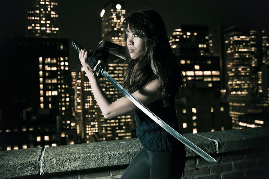 Oriental woman with a katana