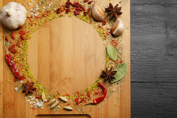 Spices round frame on cutting board