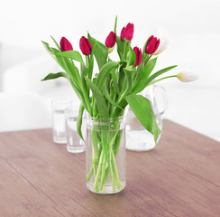 Bouquet of beautiful tulips on the table, close up