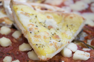 wedge of homemade pizza