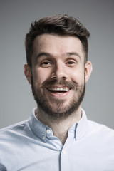 Obraz premium The young man looking at camera 