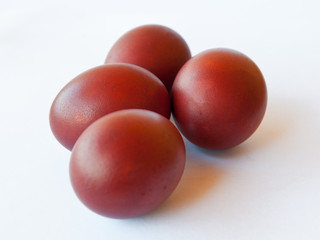 Four Easter eggs  against white background