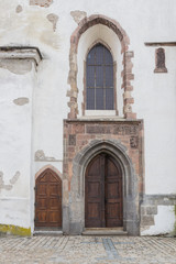 Fototapeta na wymiar Gateway to the Church. Bohemia