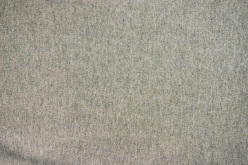 texture of a piece of light gray wool small knit