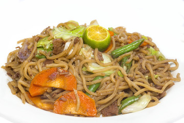 Spaghetti with vegetables and basil olives and cheese