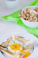 Crepes with egg, dried herbs and sea salt