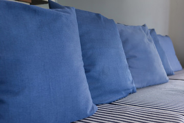 blue pillow on sofa furniture decorated in living room
