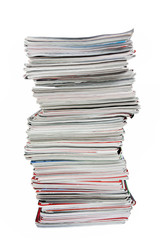 Stack of old magazines and a book
