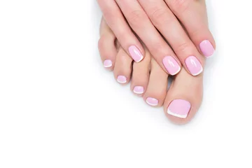Deurstickers Woman hands and feet with french manicure © svetography