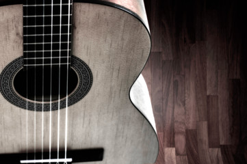 Fototapeta premium fragment of acoustic guitar. Processing in vintage style