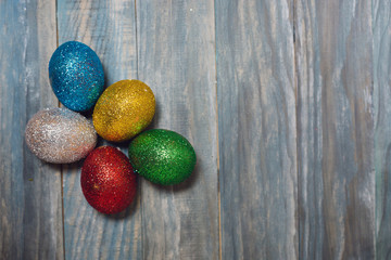 Easter eggs on wooden background