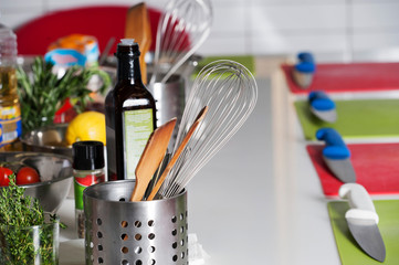 Restaurant food preparation, knives cutting boards.