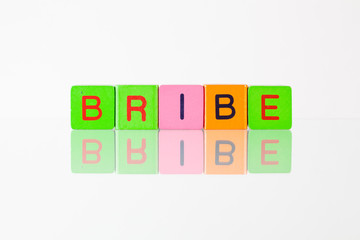 Bribe - an inscription from children's blocks