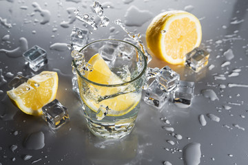 Yellow lemons and water splash