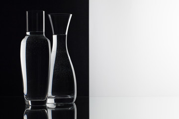 Glasses of water on the black and white background