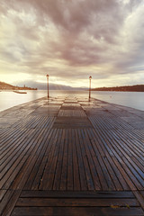 Naklejka premium romantic sunrise on the bay on Lake Garda 