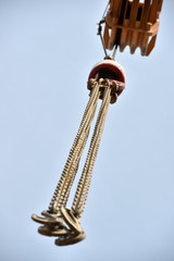 Fototapeta na wymiar Crane hook lifted up in the sky 