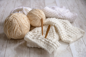 Fototapeta na wymiar balls of yarn and knitting needles