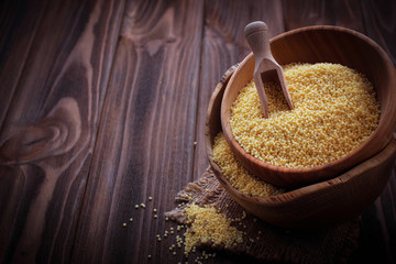 Millet in a wooden bowl