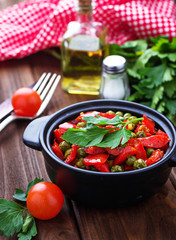 Vegetarian ragout with tomato and peas