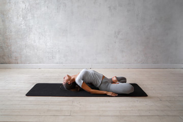 Woman practicing advanced yoga. A series of yoga poses

