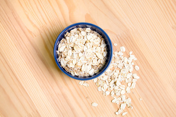 Oatmeal flakes in a  bowl