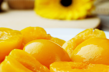 halves of peaches in syrup