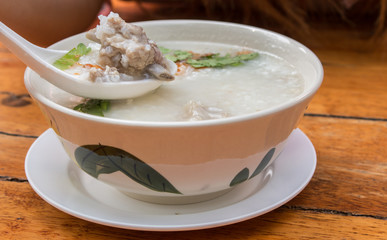 Pork rice porridge in white bow with morning light