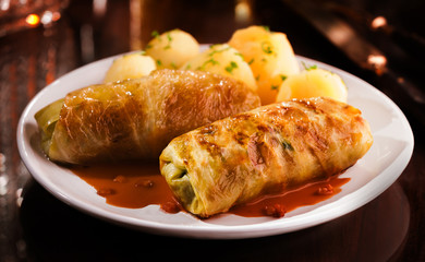 White cabbage rolls with a savory mince center - obrazy, fototapety, plakaty