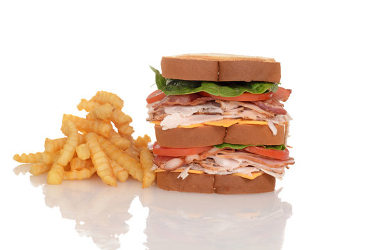 chicken club sandwich with french fries
