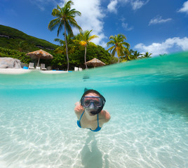 Woman snorkeling in tropical water