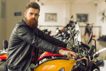 Obraz na płótnie Canvas Man with motorbike