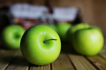 green apple in a basket