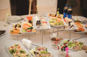 Various sweet sliced fruit on a buffet table